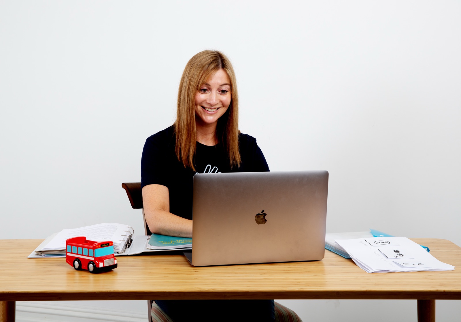 Jen Ellison at her desk